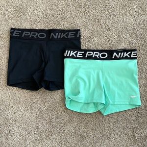 Sold as a pair of new Nike shorts/tights